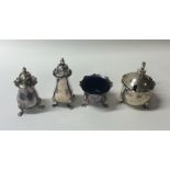 Four silver Adams' style cruets. Various dates and