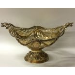 A good quality Edwardian silver gilt pedestal bowl