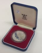 A silver proof coin. Approx. 38 grams. Est. £20 -