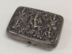An Indian silver cigarette case decorated with fig