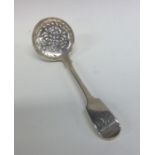 A fiddle pattern silver sifter spoon with pierced