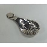 A stylish silver fluted caddy spoon. Chester. By M