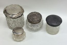 A box containing four silver mounted hobnail cut d