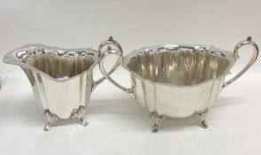 A good quality silver plated cream jug and sugar b