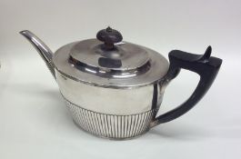 A good quality Victorian silver teapot with hinged