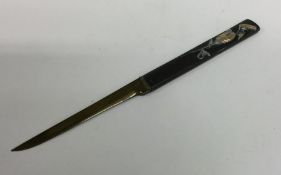 A Japanese Shakudo paper knife of typical form. Ap