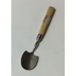 A Georgian silver cheese scoop with tapering handl