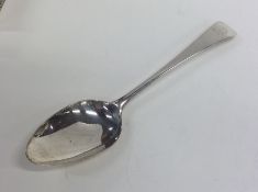 A crested silver OE pattern tablespoon. London 179