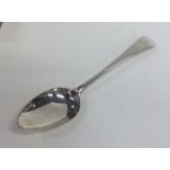 A crested silver OE pattern tablespoon. London 179