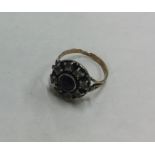 A Georgian circular cluster ring in reeded band. A