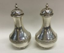A pair of good quality Victorian silver peppers wi