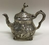 A good quality bachelor's silver teapot depicting