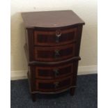 A mahogany four drawer crossbanded chest. Est. £30