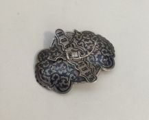 A Russian silver and niello buckle mounted with a