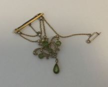 A Victorian peridot and pearl brooch on bar. Appro