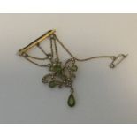 A Victorian peridot and pearl brooch on bar. Appro