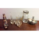 An unusual brass mounted cherry liqueur set. Est.