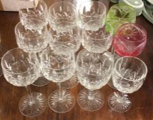 A group of twelve cut glass hock glasses. Est. £25