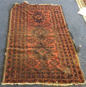 A small Oriental rug. Est. £25 - £35.