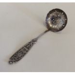 An attractive pierced silver sifter spoon with pie