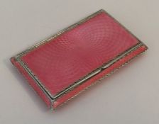 A silver and enamelled rectangular box with flush