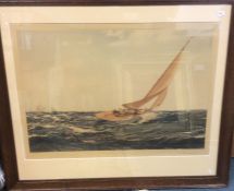 An oak framed and glazed print depicting a sailing