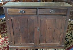 An old stained pine two drawer sideboard. Est. £20