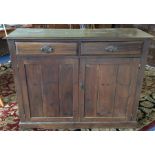 An old stained pine two drawer sideboard. Est. £20