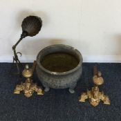 A pair of brass dog irons together with a lamp etc