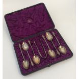 A good cased set of six silver gilt teaspoons toge