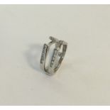 A good white gold and diamond ring of stylish form
