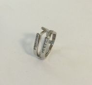 A good white gold and diamond ring of stylish form
