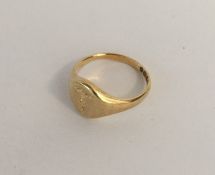An 18 carat gold gent's signet ring. Approx. 3.8 g