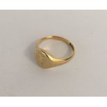 An 18 carat gold gent's signet ring. Approx. 3.8 g