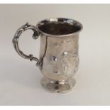 A Victorian silver christening cup with floral dec