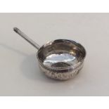 An unusual silver toddy ladle with coin centre. Ap