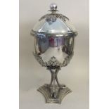 An unusual domed top vase and cover attractively p