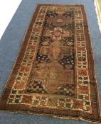 An Oriental runner. Est. £30 - £50.