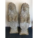 A pair of concrete figures of rampant lions. Est.