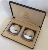 A cased pair of Bahamas 10 Dollar coins. Est. £30