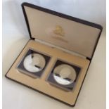 A cased pair of Bahamas 10 Dollar coins. Est. £30