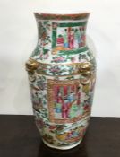 A large Canton vase decorated in bright colours. A