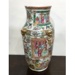 A large Canton vase decorated in bright colours. A