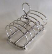 A heavy Edwardian silver toast rack / smartphone d