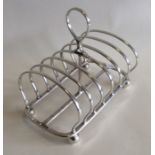 A heavy Edwardian silver toast rack / smartphone d