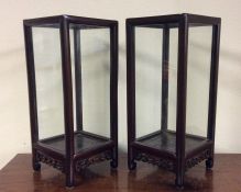 A good pair of Chinese hardwood display cases on c