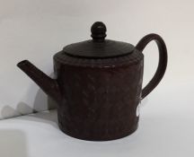 An early terracotta Chinese teapot with textured b