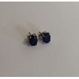 A pair of sapphire single stone ear studs. Est. £5