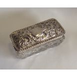 A rectangular hobnail cut silver box with lift-off