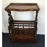 A Victorian mahogany music stand with barley twist